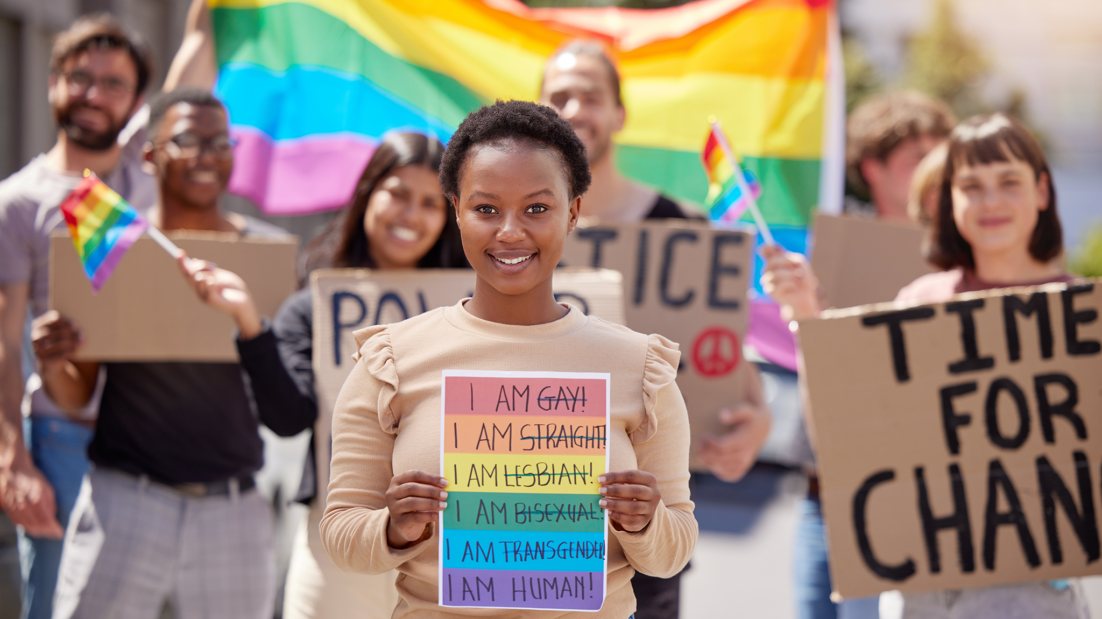 Shot of a group of young people protesting for lgbtq rights