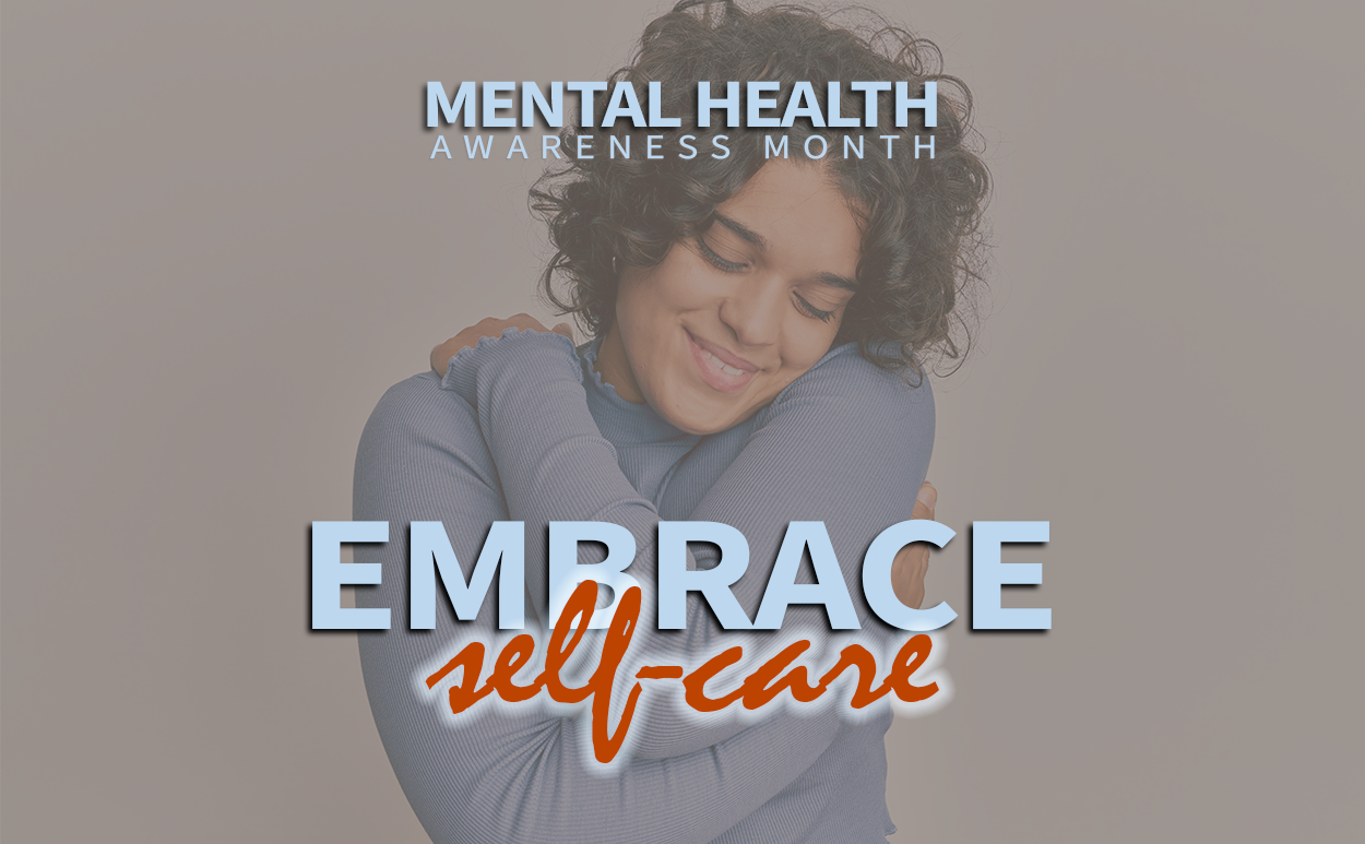 A young woman in a blue sweater hugs herself behind a text overlay that says, "Embrace Self-Care," and Mental Health Awareness Month